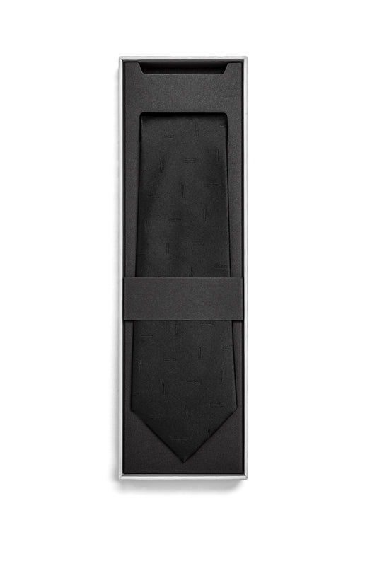 Monogram Tie Black in a slim gift box, with fine tone-on-tone stripe pattern and monogram design on the entire tie; unisex by OLAKALA.