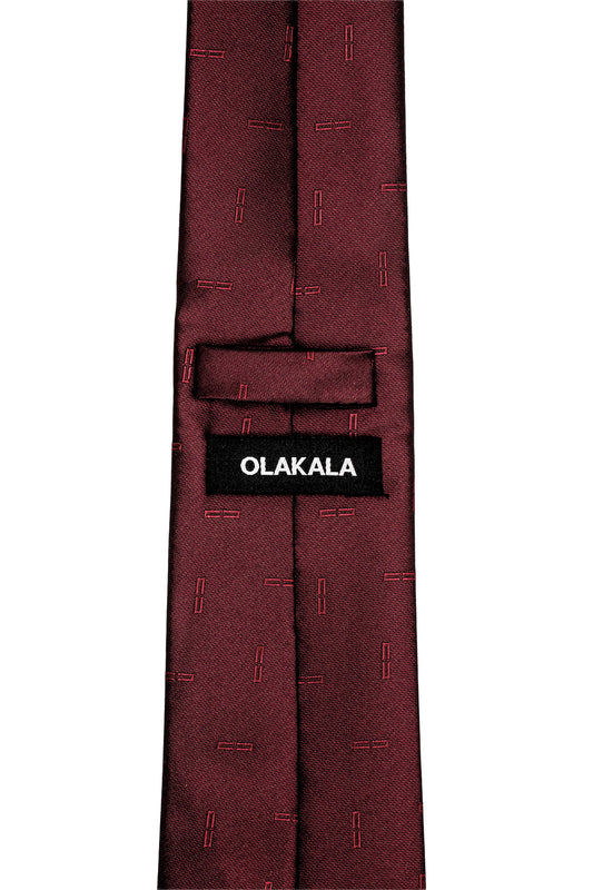 Back of the Bordeaux burgundy monogram tie with subtle bar pattern. Fabric loop and black label with