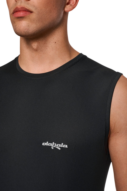 Close-up of a Sports Function Tanktop Black with OLAKALA logo, showing the antibacterial, breathable fabric for sports and leisure activities.