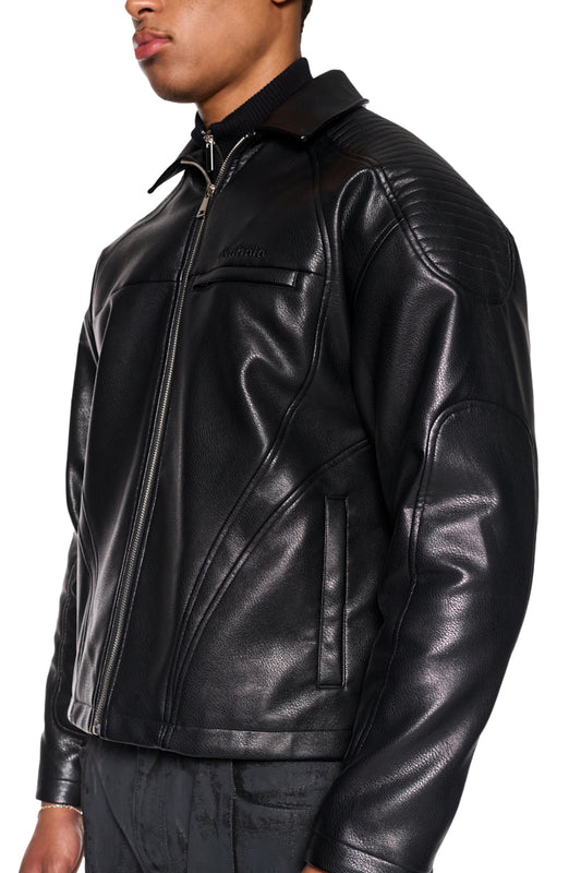 CI Leather Jacket Black made of vegan faux leather, oversized unisex design with padded shoulders, zipper, welt pockets and OLAKALA monogram lining.