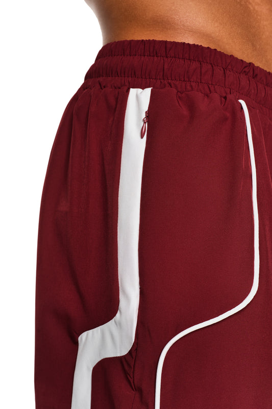 0asis Swim Shorts Rot aus leichtem, elastischem Material mit Mesh-Innenfutter, kontrastierenden Einsätzen und silikonbeschichteten Kordelzügen, ideal für Bewegungsfreiheit am Pool oder Strand.