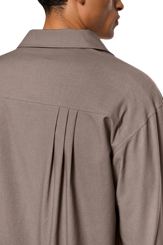 Sun Linen Blazer with asymmetric safari collar, removable shoulder padding, shirt button placket, cuffs with buttons, pleat details and back vent, unisex design by OLAKALA.