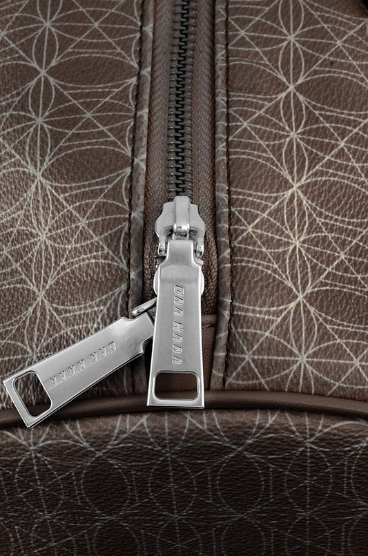 CC Weekender Bag Brown with OLA KALA metal zipper, detachable shoulder strap and inner pocket, ideal as a stylish everyday accessory.