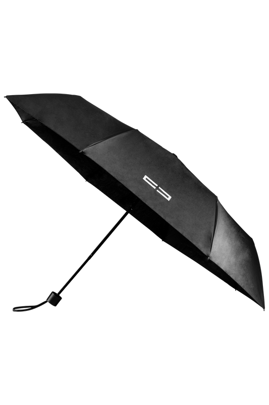 CC Core Regenschirm mit schwarzem Griff und weißem Text, ideal für stilvollen Schutz vor Regen. Perfekt für den offiziellen OLAKALA® Onlineshop.
