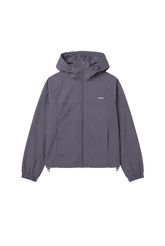 Windbreaker Icon Gray mit verstellbarer Kapuze, Frontreißverschluss, elastischen Bündchen, diskreten Seitentaschen und kleinem Logo auf der Brust, ideal für Training und Alltag.