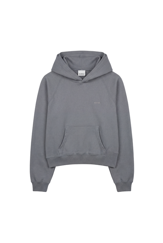 OLAKALA Double Hood Hoodie Gray mit Kängurutasche, Raglanärmeln, weitem Schnitt und kleinem Logo auf der Brust.