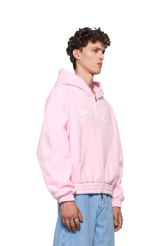 Mann trägt Elysium Zip Hoodie Pink mit 2-Wege-Reißverschluss, Teilungsnähten, Eingriffstaschen und Elysium-Grafik. Oversized Passform, unisex, von OLAKALA.
