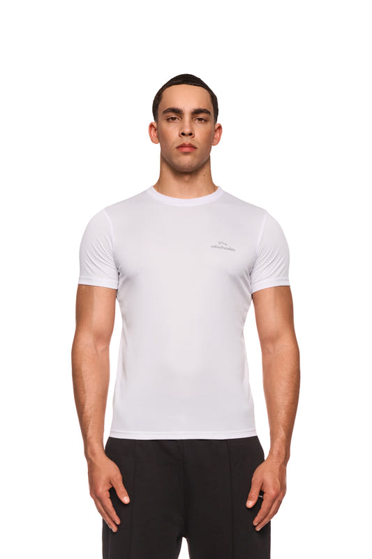 Man wears the OLAKALA Sports Performance T-shirt in white, slim fit, ideal for sports, leisure and outdoor, with logo on the chest.