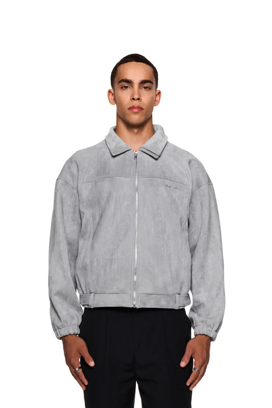 Man wears CC Anatomy Velour Jacket Light Gray with double-layer collar and metal zipper, loose fit.