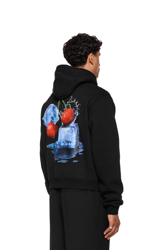 Black hoodie, viewed from the back, featuring a print of ice cubes, red cherries, and splashing water.