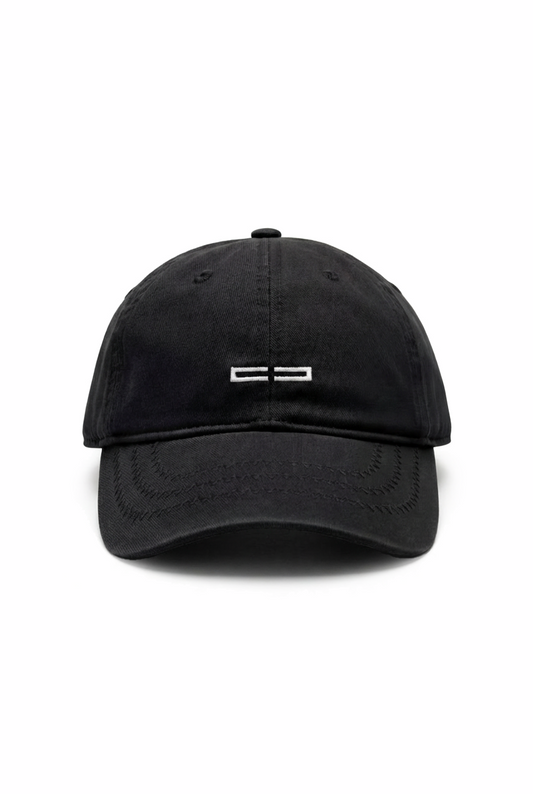 CC Icon Cap Black, black baseball cap with an embroidered OLAKALA logo on the front, adjustable with a metal clip at the back, one size fits all.